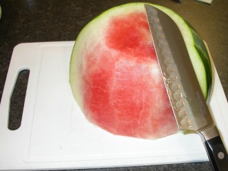 Watermelon and Cucumber Salad - peeling watermelon